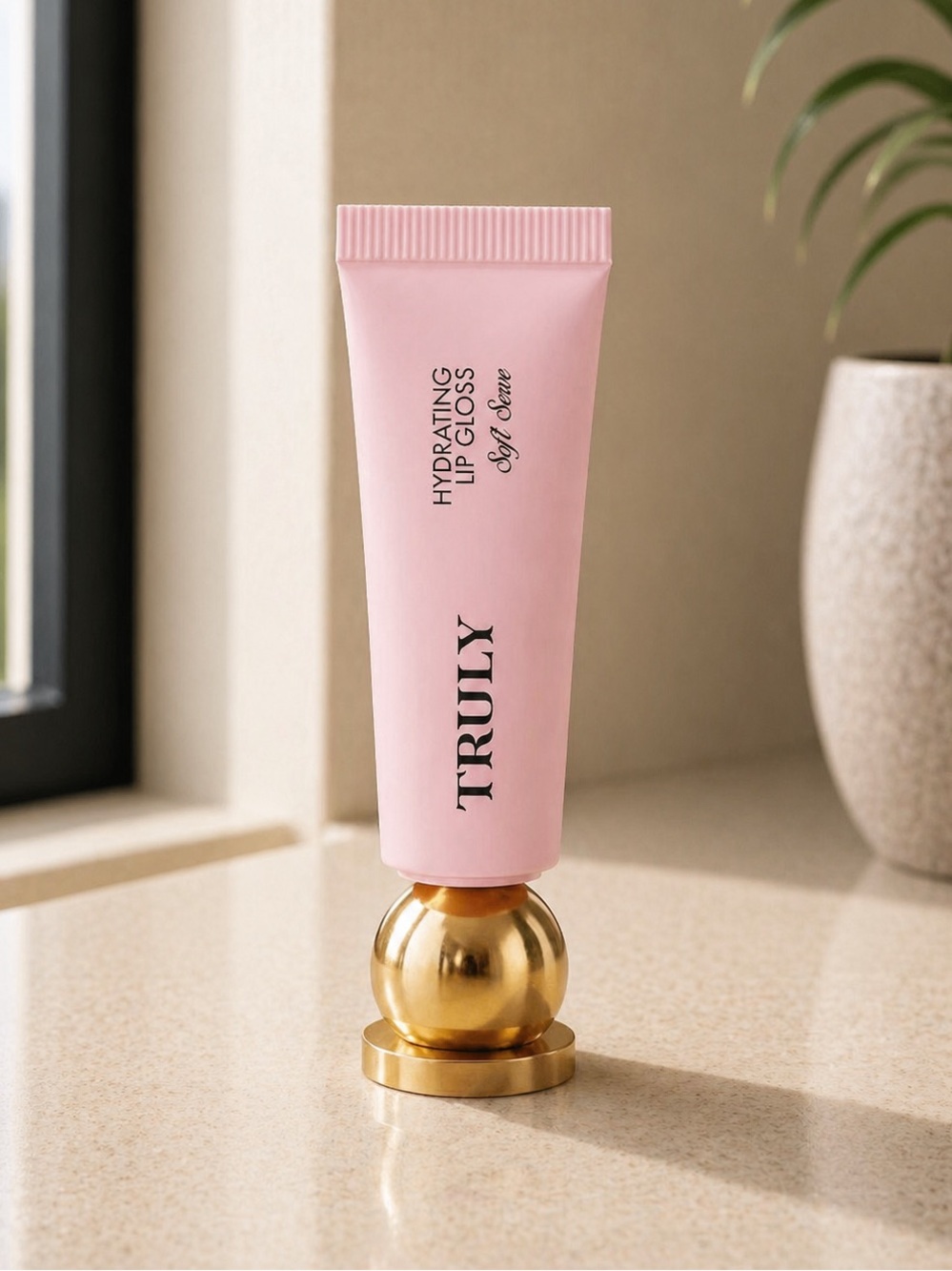 $29 New Truly Hydrating Lip Gloss - Soft Serve